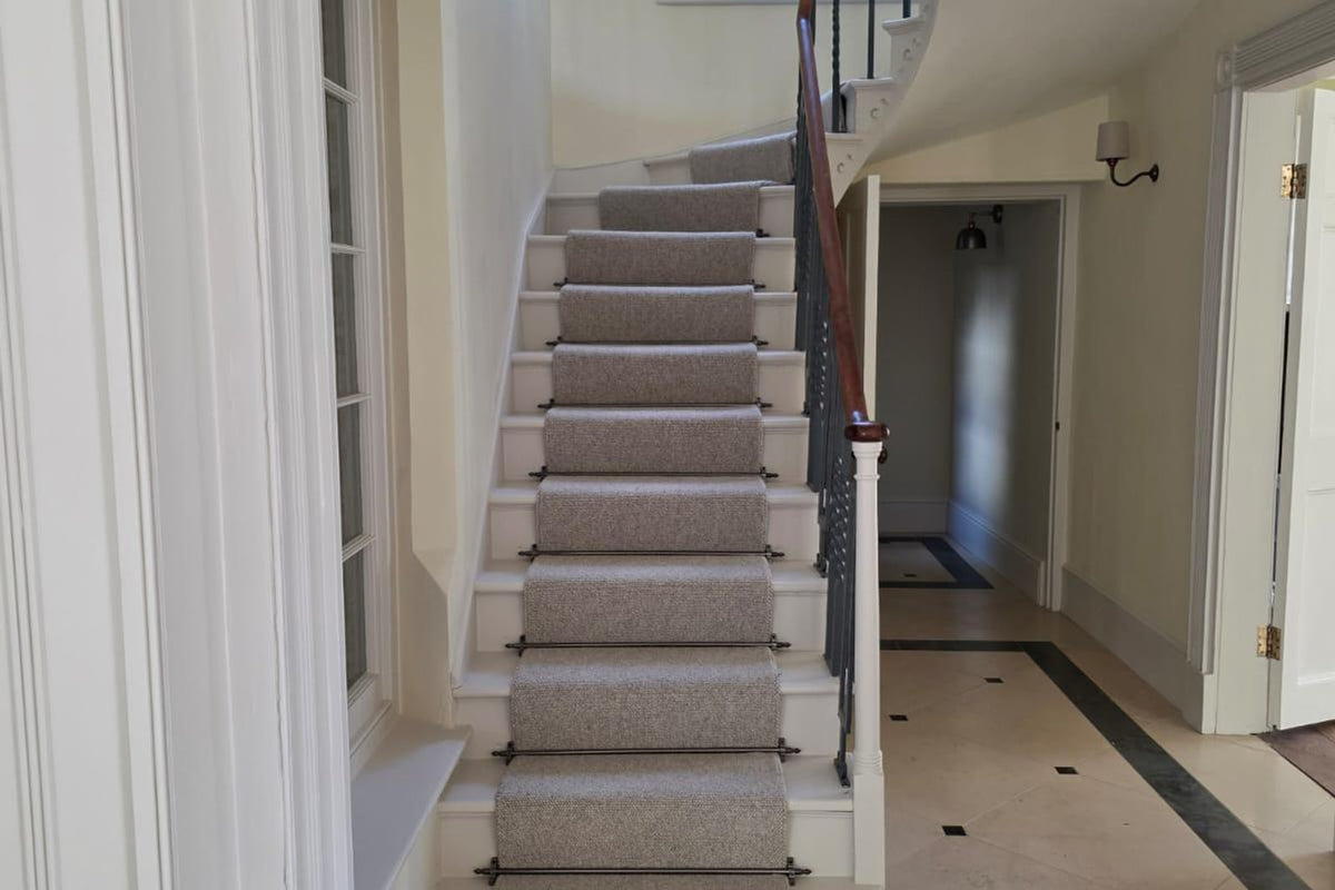 Brockway Padstow wool carpet runner and stair rods at Grosvenor House in Falmouth