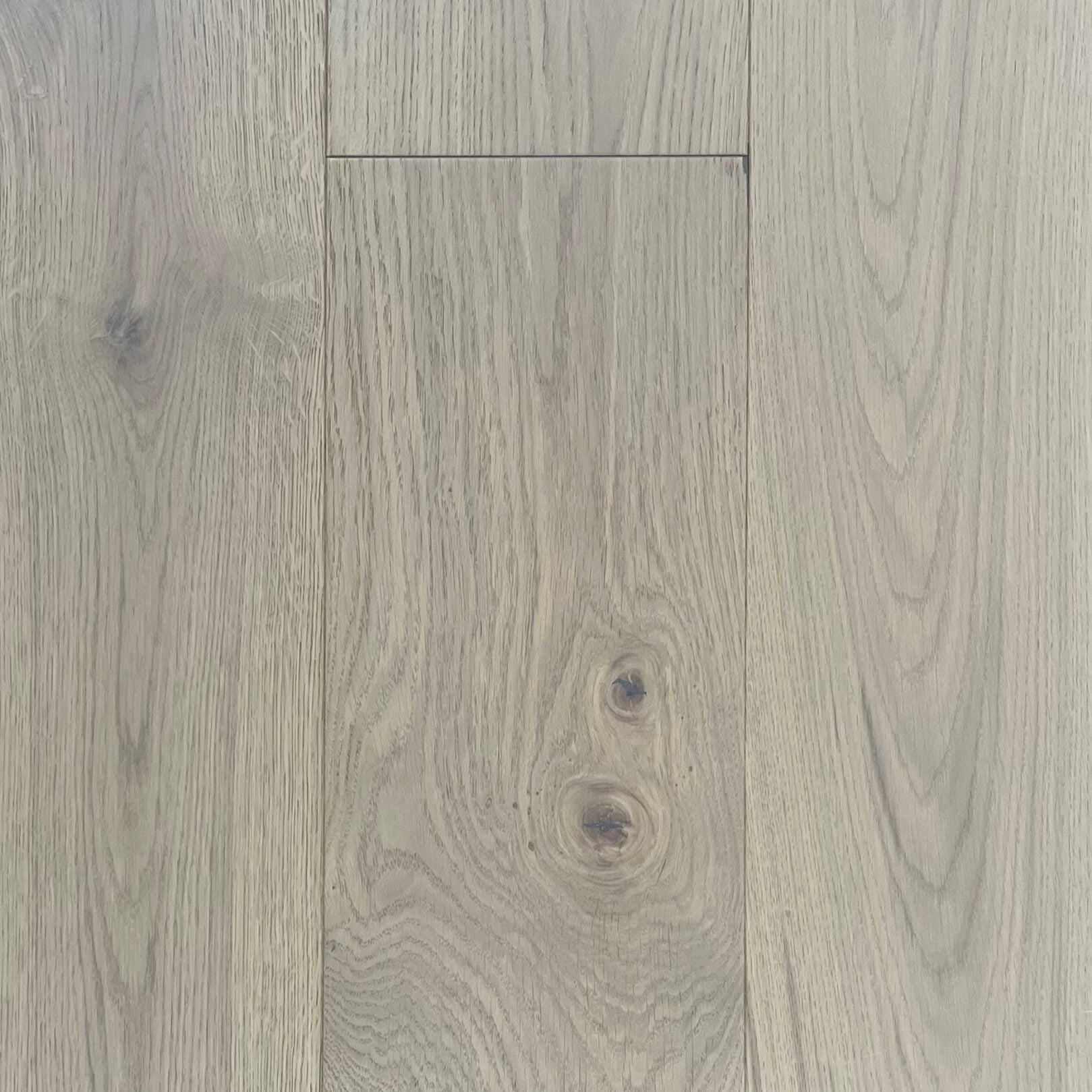 Close-up of gray wood flooring with visible grain and texture