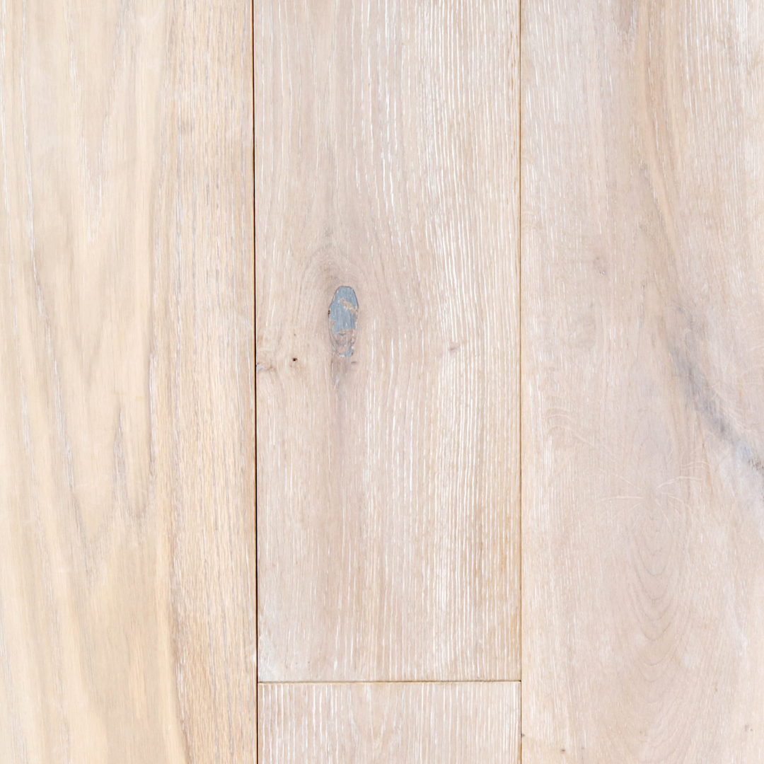 Close-up of light wooden flooring with a natural finish